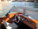 lovely 1960s taxi boat - straight out of a James Bond film